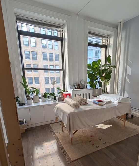 Bright, plant-filled treatment room