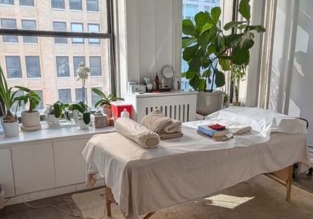 Bright treatment room with plants and natural light